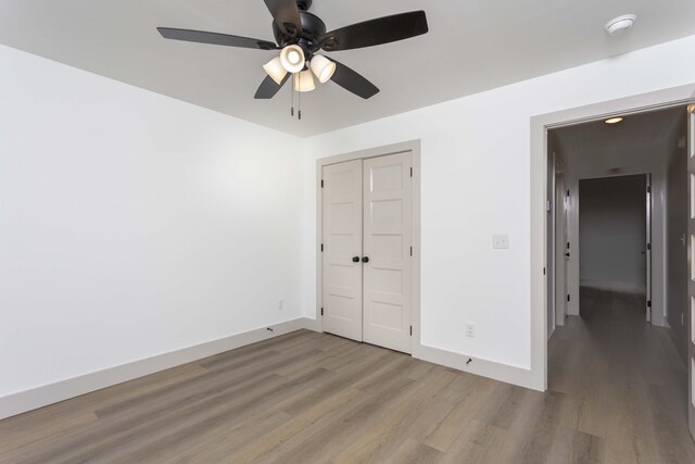 11942 Old Dayton Pike, Soddy-Daisy, TN 37379 - spare room featuring baseboards, a ceiling fan, and wood finished floors