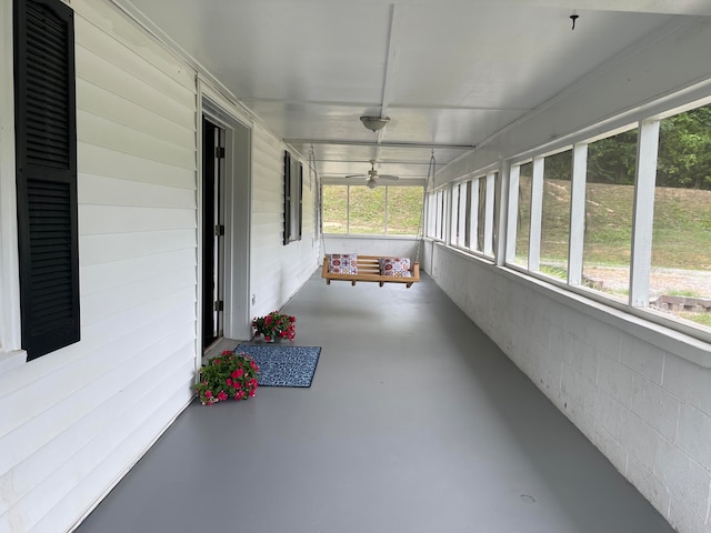 unfurnished sunroom featuring a healthy amount of sunlight