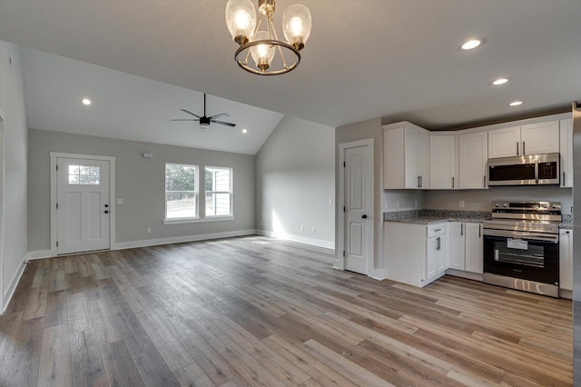 kitchen with white cabinetry, appliances with stainless steel finishes, and light wood-type flooring