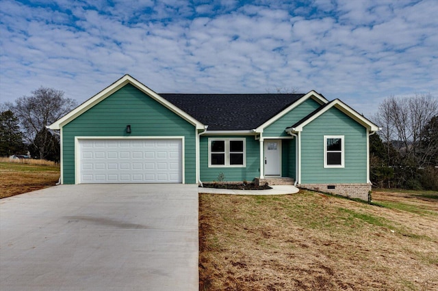 ranch-style home with a garage and a front yard