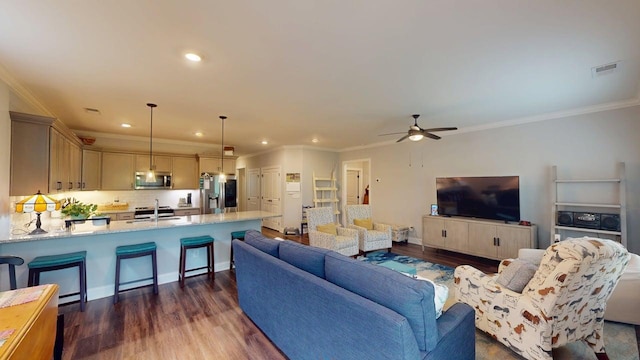 6453 Serenade Ln, Hixson, TN 37343 - living area with ceiling fan, visible vents, dark wood-style floors, ornamental molding, and recessed lighting
