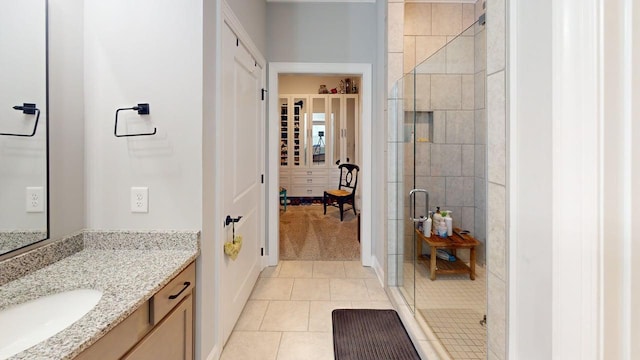 6453 Serenade Ln, Hixson, TN 37343 - full bathroom with vanity, tile patterned flooring, and a stall shower