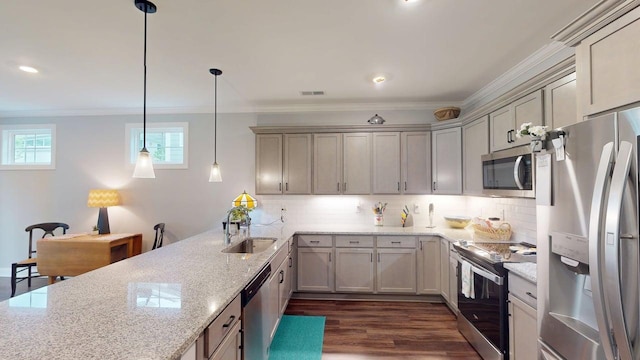 6453 Serenade Ln, Hixson, TN 37343 - kitchen featuring crown molding, decorative backsplash, a peninsula, a sink, and stainless steel appliances