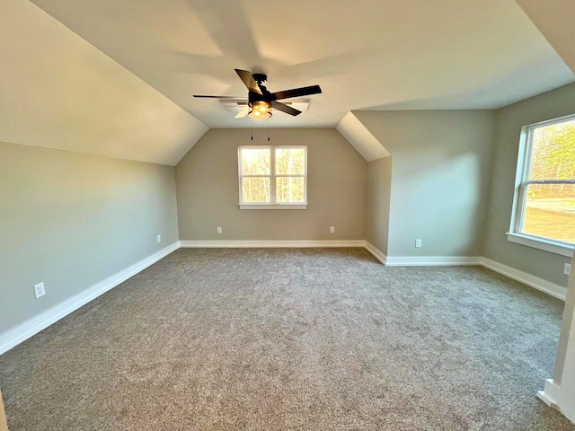 bonus room featuring ceiling fan, lofted ceiling, and carpet floors