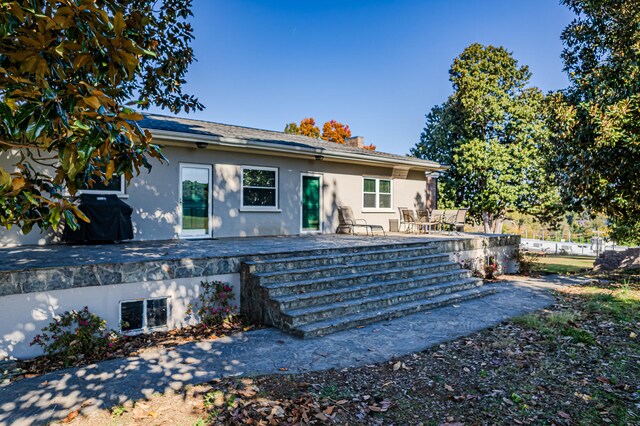 rear view of property with a patio