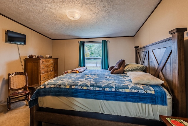 carpeted bedroom with a textured ceiling and ornamental molding