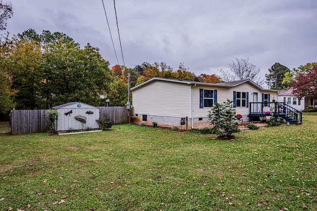 exterior space featuring a storage shed and a lawn