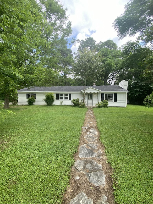 2320 Raines Dr NW, Cleveland, TN 37311 - ranch-style house with a chimney and a front lawn