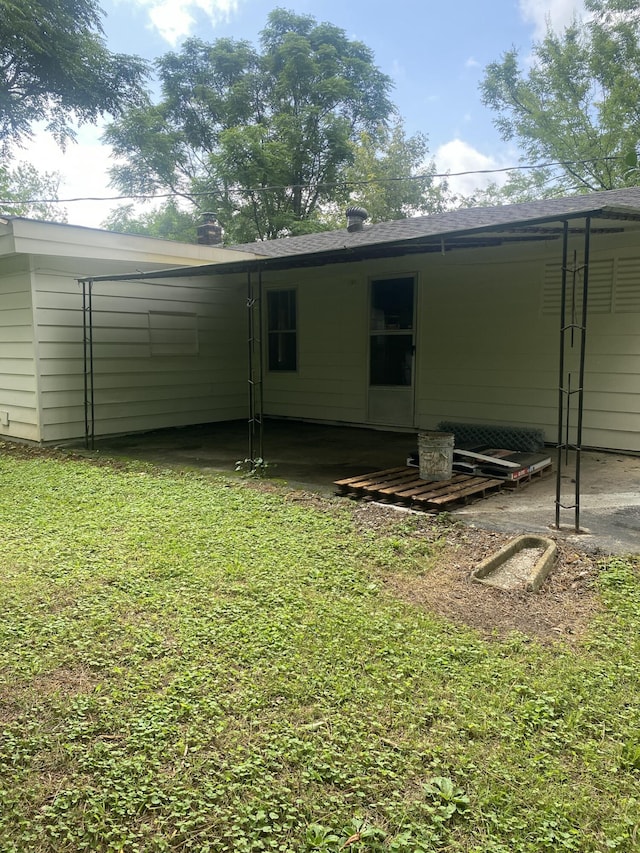 2320 Raines Dr NW, Cleveland, TN 37311 - rear view of house with a lawn