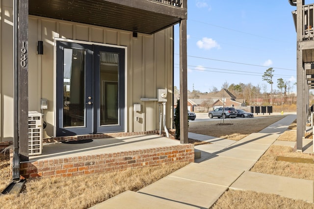 1930 Addi Ln, Chattanooga, TN 37421 - property entrance featuring board and batten siding, a porch, and french doors