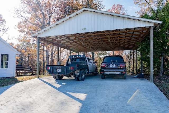 view of parking / parking lot featuring a carport