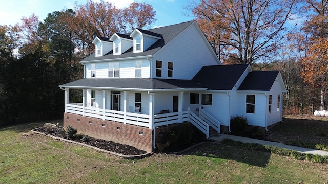 view of front facade with a porch and a front lawn