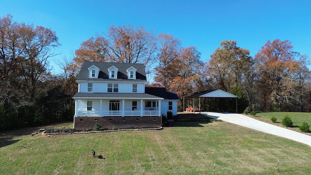 view of front of property featuring a carport and a front yard