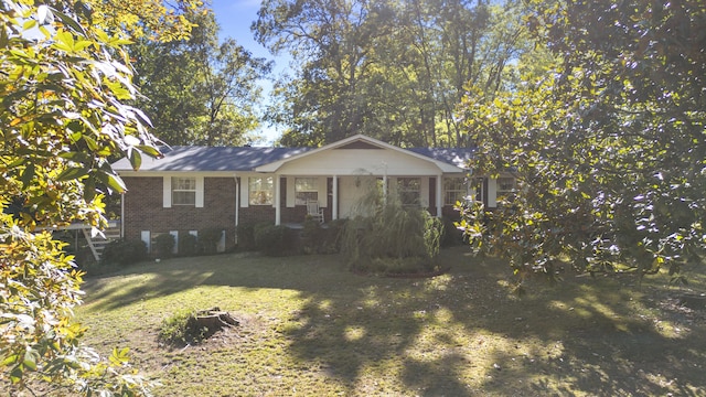 view of front of home with a front yard