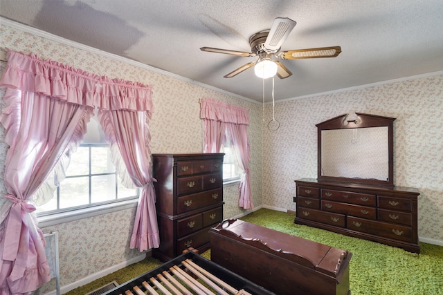 bedroom with multiple windows, ceiling fan, crown molding, and a textured ceiling