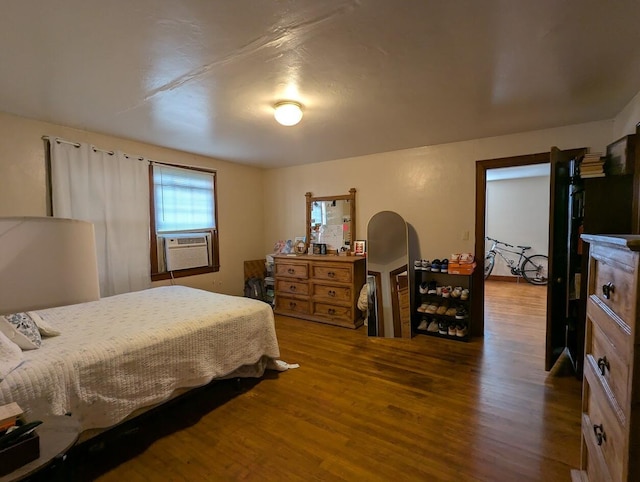 525 4th St NW, Cleveland, TN 37311 - bedroom featuring cooling unit and wood finished floors