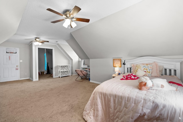 bedroom with lofted ceiling, carpet, baseboards, and ceiling fan