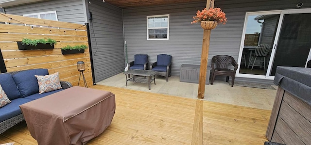 wooden terrace with outdoor lounge area