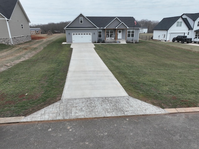 view of front of house featuring a garage and a front lawn