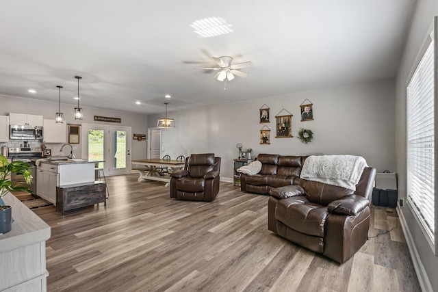 123 Tommy Loop, Sweetwater, TN 37874 - living area with wood finished floors, ceiling fan, recessed lighting, and baseboards
