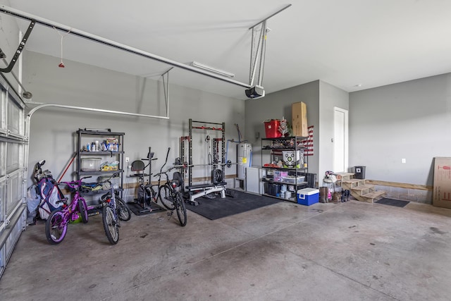 123 Tommy Loop, Sweetwater, TN 37874 - garage featuring water heater and a garage door opener