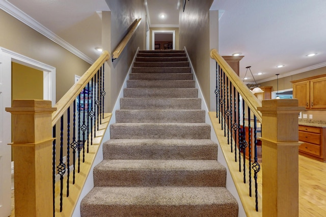 101 NW Amherst Way, Cleveland, TN 37312 - stairs featuring ornamental molding, wood finished floors, and recessed lighting