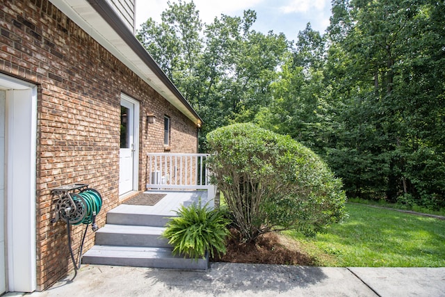 101 NW Amherst Way, Cleveland, TN 37312 - property entrance featuring brick siding and a lawn