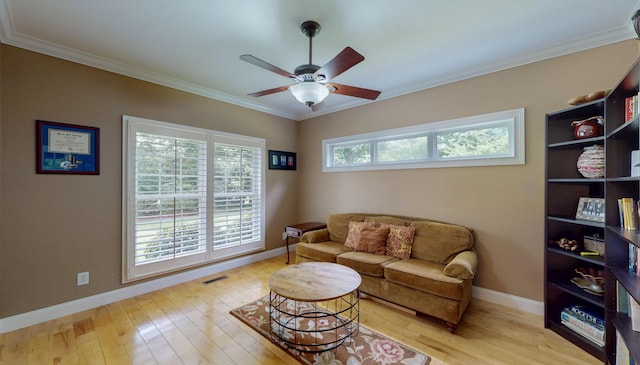 101 NW Amherst Way, Cleveland, TN 37312 - living room with ornamental molding, ceiling fan, and light wood-type flooring