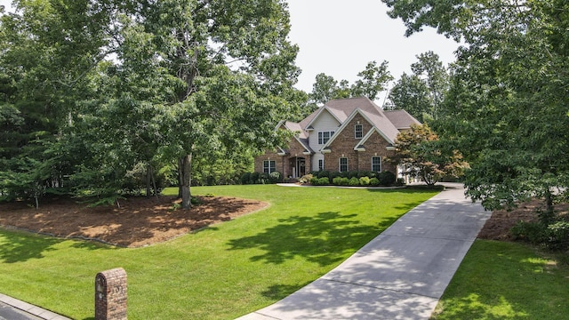 101 NW Amherst Way, Cleveland, TN 37312 - traditional home with a front yard and stone siding