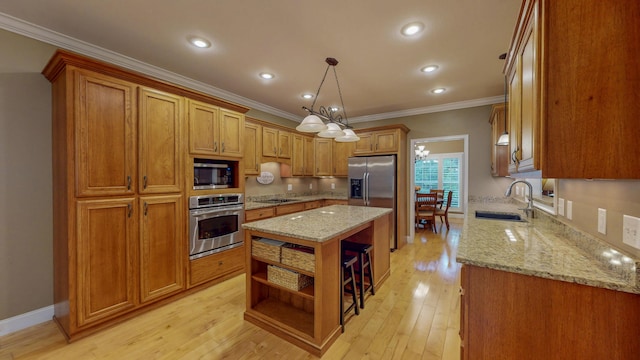 101 NW Amherst Way, Cleveland, TN 37312 - kitchen featuring appliances with stainless steel finishes, open shelves, brown cabinets, crown molding, and a center island