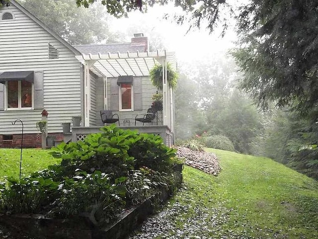 105 Hicks Adams Dr, Reliance, TN 37369 - view of green lawn featuring a pergola
