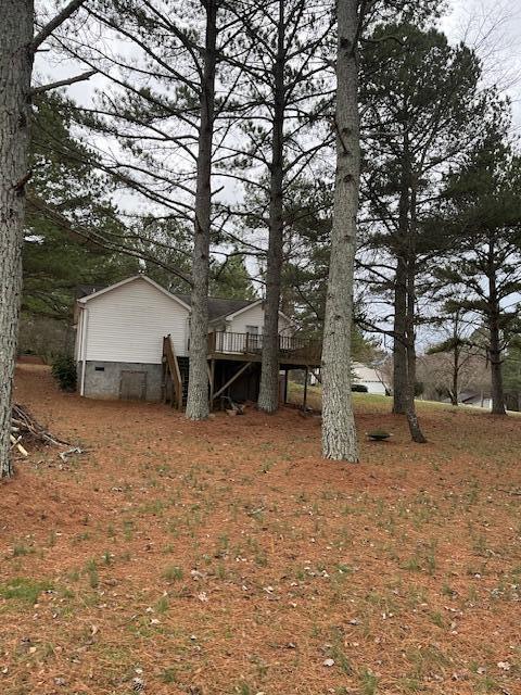 view of yard featuring a deck