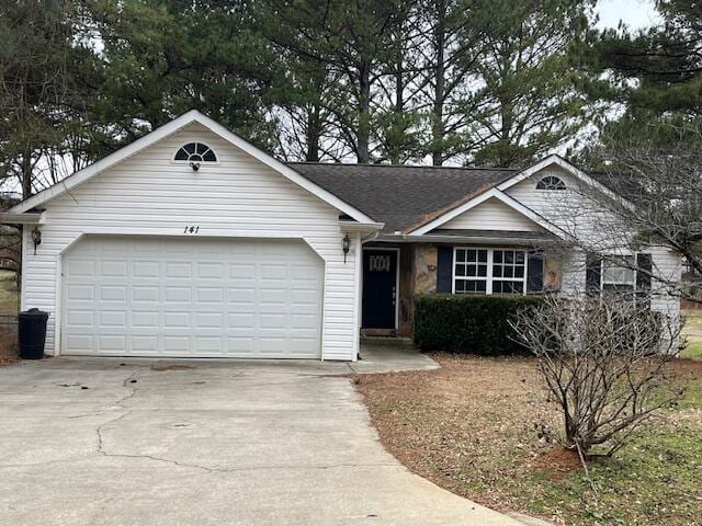 ranch-style house with a garage