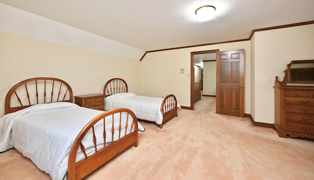 bedroom with lofted ceiling, ornamental molding, baseboards, and light carpet
