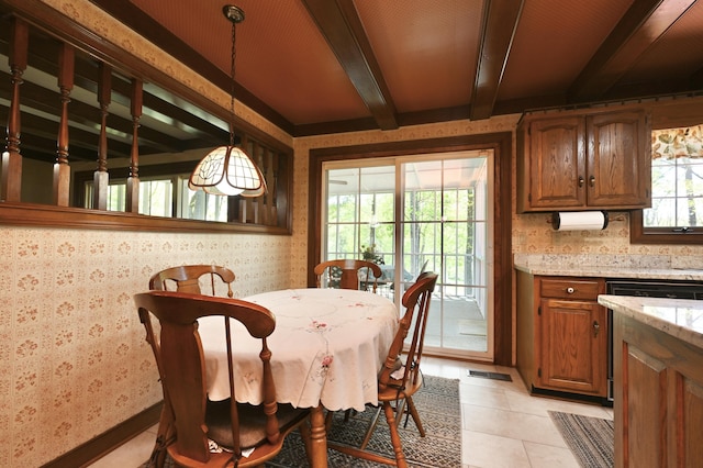 dining room with beamed ceiling, wallpapered walls, visible vents, and light tile patterned flooring