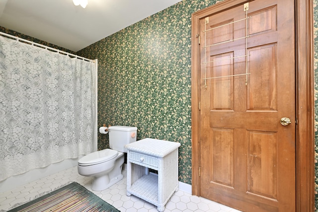 full bathroom with wallpapered walls, shower / bathtub combination with curtain, tile patterned floors, and toilet
