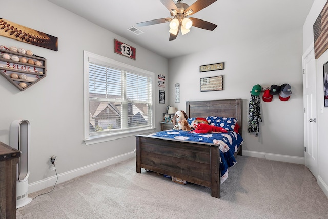 carpeted bedroom featuring ceiling fan