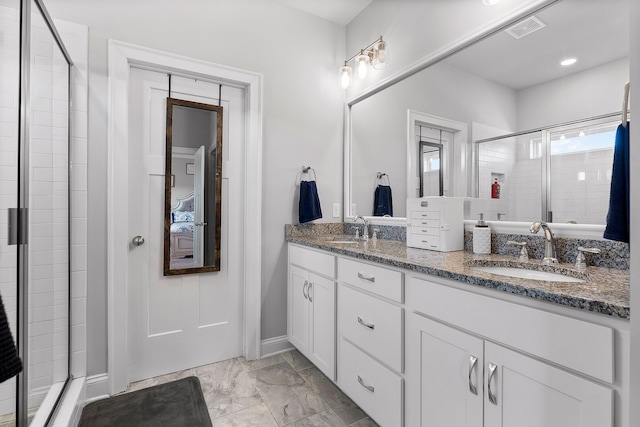 bathroom featuring vanity and walk in shower