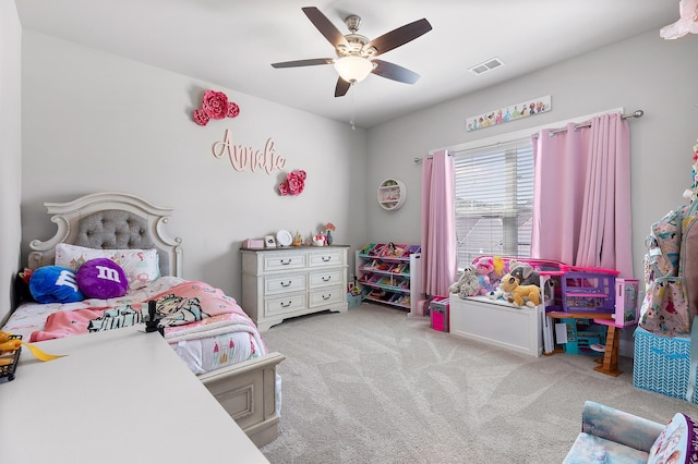 bedroom featuring light carpet and ceiling fan