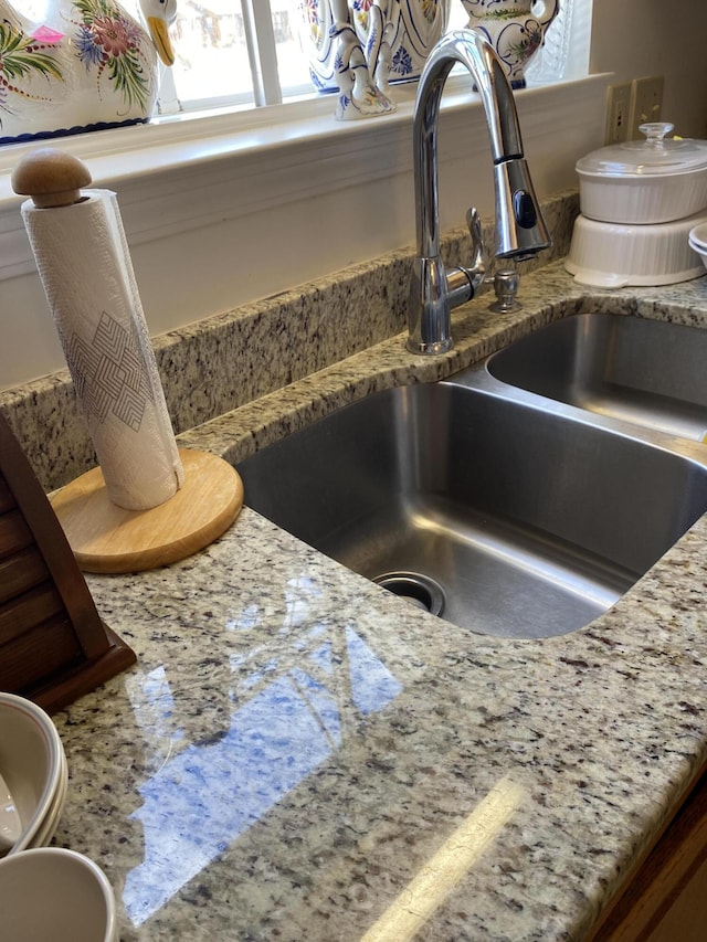 interior details featuring a sink