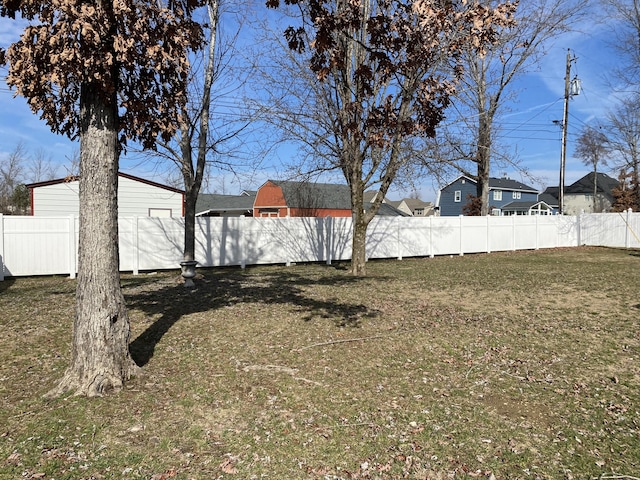 view of yard featuring fence