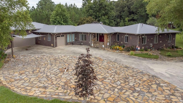 single story home featuring a garage