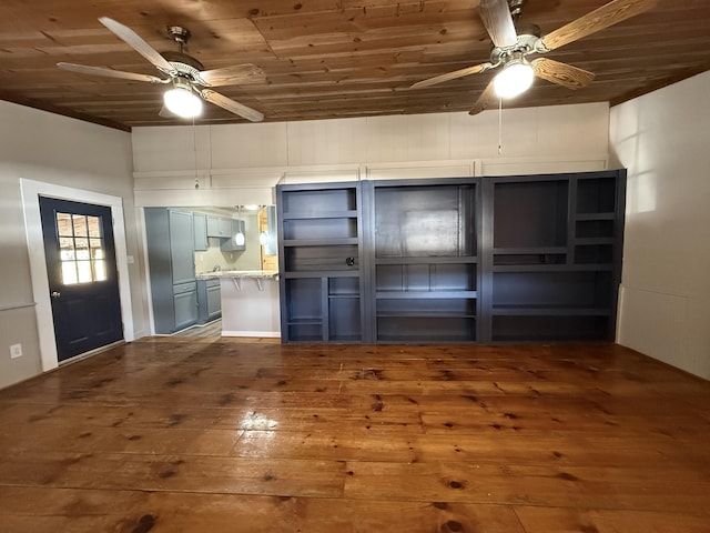 kitchen with dark wood-type flooring, wooden ceiling, and ceiling fan