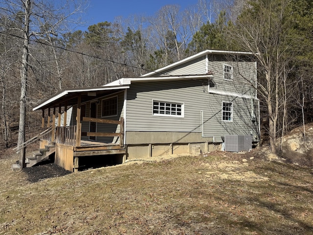 view of side of property featuring cooling unit