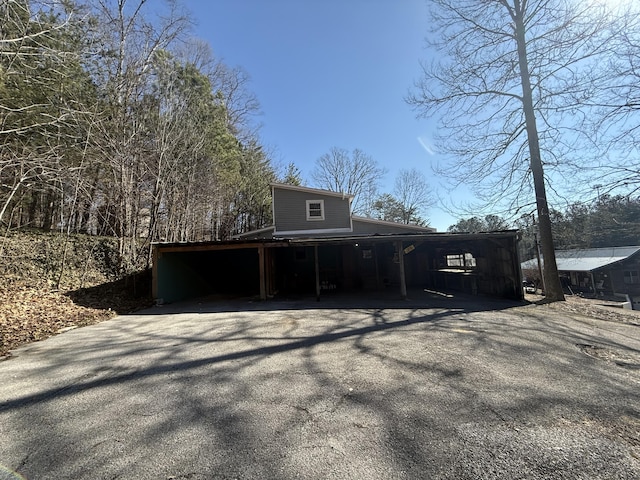 exterior space featuring a carport