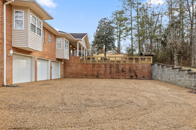 view of yard featuring a garage