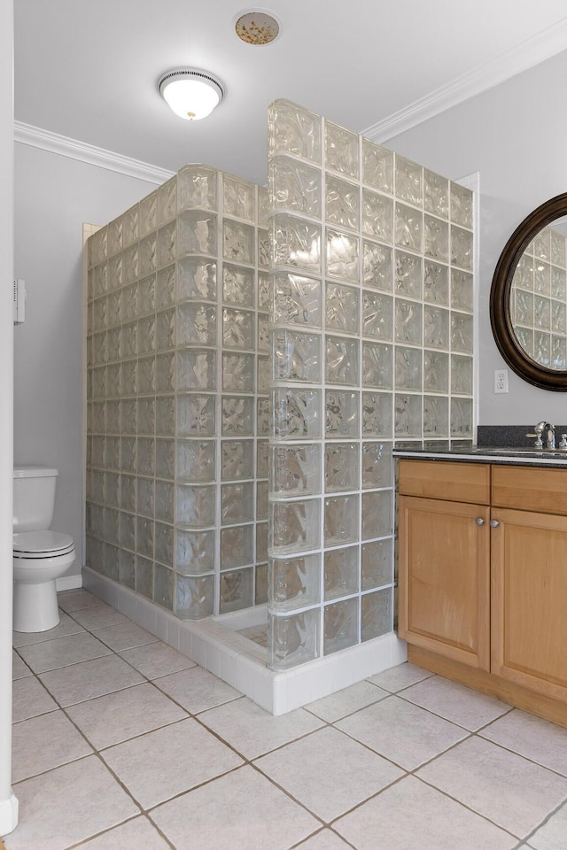 bathroom featuring tile patterned flooring, crown molding, and walk in shower