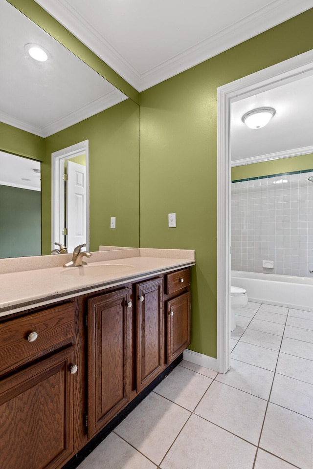 bathroom featuring ornamental molding, tile patterned floors, toilet, and vanity