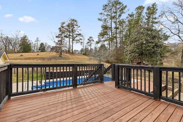 deck with a covered pool