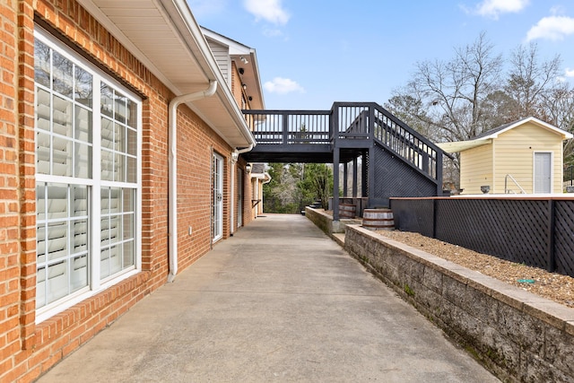 view of home's exterior with a deck